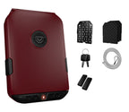 Red portable biometric safe with keypad, keys, mounting plate, foam inserts, and security cable.