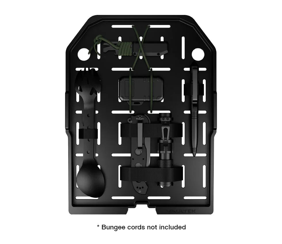 Organizer panel for safe with utensils, flashlight, and pen securely strapped