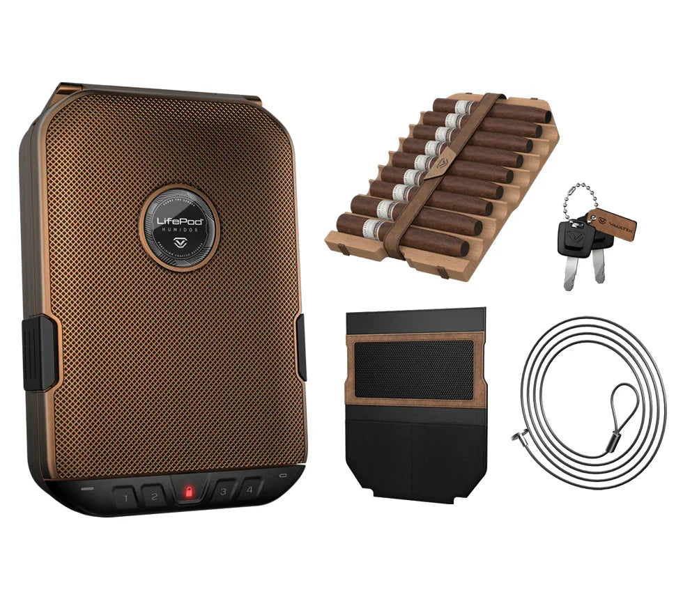 Cigar humidor safe with accessory kit, cable lock, tray holding cigars, and key set.