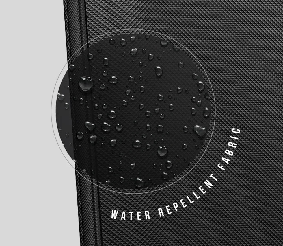 Close-up of black textured waterproof safe fabric with water droplets
